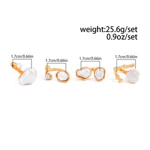 Detailed view of four irregular baroque pearl gold ring set with dimension labels