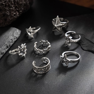 7-piece set of men's vintage silver pentagram rings with star motifs and oxidized finish