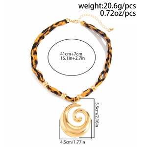 Detail view of leopard print choker necklace with gold pendant and size specifications