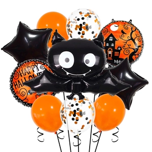 Detail of Halloween balloon set featuring black bat foil and orange latex balloons