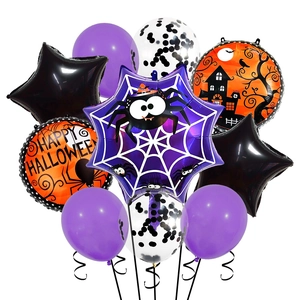 Detail of Halloween balloon set featuring spider web foil and Happy Halloween round balloons