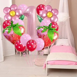Strawberry first birthday balloon set with pink number one and floral foil balloons