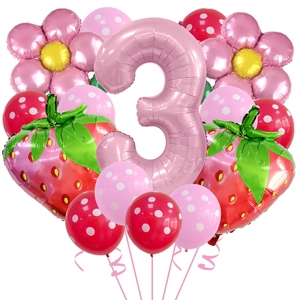 Close-up of strawberry birthday balloon set with a pink number 3 and floral accents