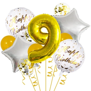 Detail of golden number 9 foil balloon set with white happy birthday round balloons