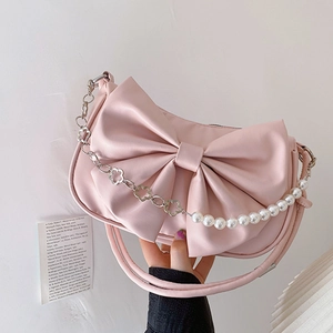 Sac à main rose avec nœud, chaîne en perles et fleurs en métal pour mode féminine