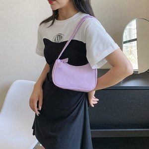 Minimalist light purple faux leather shoulder bag with decorative bow detail