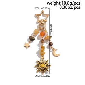 Detailed view of celestial sun moon star keychain with measurements in centimeters