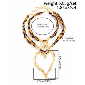 Detailed view of layered necklace set with leopard print heart pendant and size specs