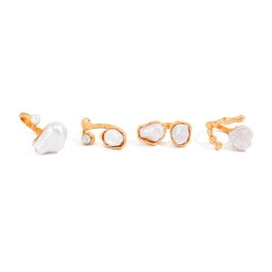 Baroque pearl ring set with four irregular gold open rings in a minimalist design