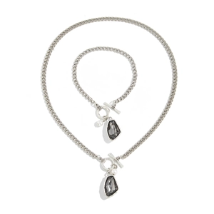 Silver geometric necklace and bracelet set with dark grey gems and pearl charms