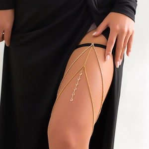 Bohemian gold leg chain with sparkling rhinestones and elastic black thigh band