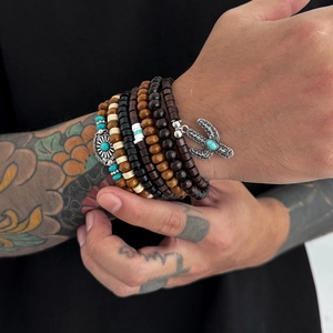 Bohemian stacked bracelet set with dark wood beads and cactus turquoise pendant
