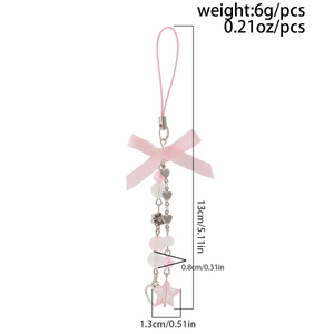 Dettaglio ciondolo telefono rosa con fiocco, lunghezza 13cm e peso 6g specificati