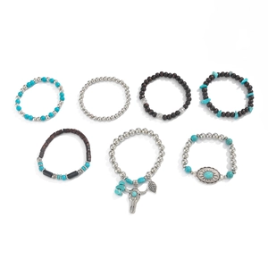 7-piece Bohemian bracelet set with turquoise stones, wooden beads, and silver bull pendant