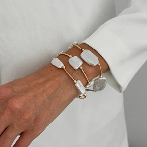 Baroque pearl bracelet set with three pieces of irregular gold bangles for women