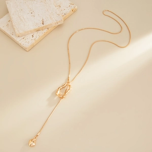 Minimalist gold Y-shaped snake chain necklace with irregular geometric circle and drop pendant
