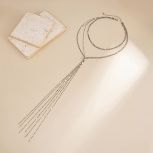 Three-layer silver Y-shaped sequin tassel necklace with elegant metallic fringe detail