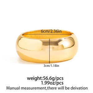Polished gold wide cuff bracelet showing dimensions of 6cm diameter and 3cm width