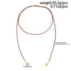 Bruine kralenketting lengte 155cm met gouden schelphangers weegt 20,2 gram