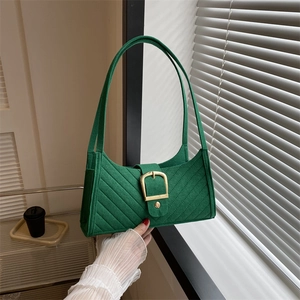 Green felt underarm bag with quilted stitching and vintage gold clasp for women