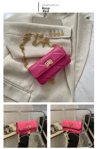 Detail of rose red quilted crossbody bag featuring a golden chain strap and twist lock