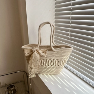 Women's French Pastoral Woven Handbag With Lace Bow Knot Hollow Wave Pattern Casual Cotton Rope Beach Tote Bag