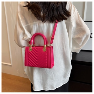 Magenta chevron quilted small square bag with woven handle and gold metal hardware