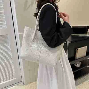 Minimalist silver sequin tote bag for women featuring large capacity and sleek straps