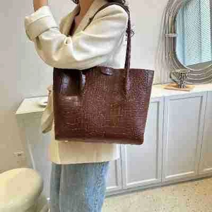 Minimalist dark brown crocodile embossed leather tote bag for women commuting stylishly