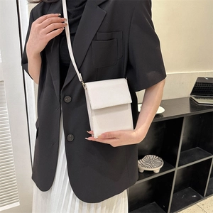 Minimalist white leather crossbody bag for women in a modern rectangle flap style