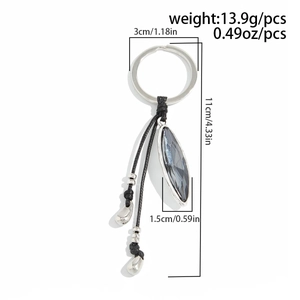 Detailed view of bohemian keychain with grey faceted stone and precise dimensions