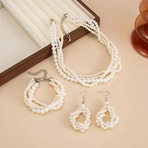 Elegant multi-layer pearl jewelry set with necklace bracelet and geometric earrings