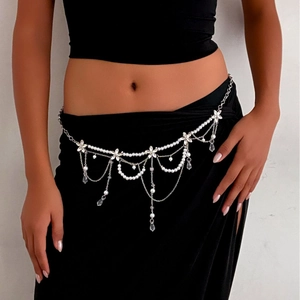 Elegant silver pearl waist chain with flower accents and layered crystal tassels