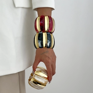 Modern wide resin bangle with marble pattern and gold metal accents for women