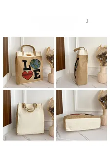 Detailed views of jute canvas tote bag with leather handles and printed heart pattern