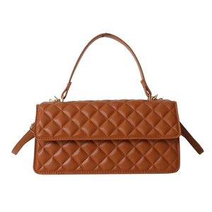 Classic caramel quilted crossbody bag with top handle and golden metal hardware