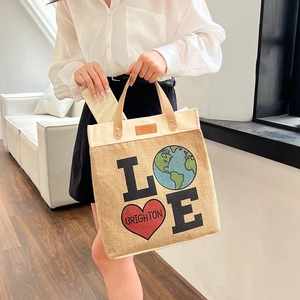 Chic canvas and jute tote bag with LOVE print and leather handles for women