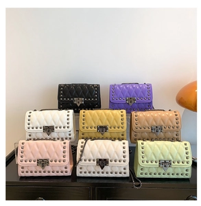 Detailed grid of quilted crossbody bags with metal studs and chain straps in seven colors