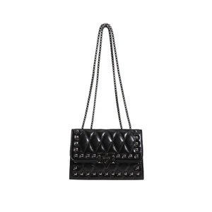 Fashionable black quilted leather crossbody bag with metal studs and chain strap