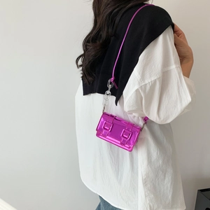 Metallic magenta square crossbody bag with acrylic chain and dual buckle flap closure