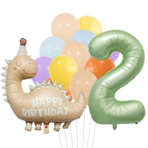 Close-up of olive green number 2 balloon with beige dinosaur and pastel party balloons