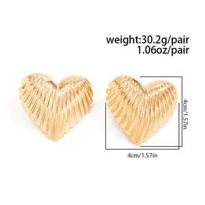 Detailed view of large gold heart earrings with size and weight measurement specs