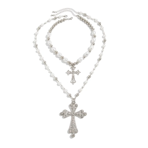 Cyberpunk layered necklace with silver cross pendants, pearls, and sparkling rhinestones