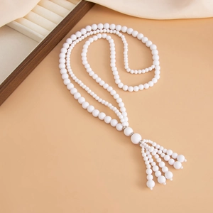 Multi-layer white acrylic beaded long necklace with elegant tassel pendant on silk