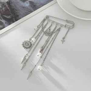 Silver safety pin brooch with hanging chains, imitation pearls and evil eye star charms