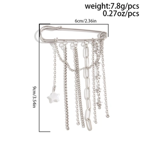 Close-up of silver metal star tassel brooch with dimensions 6cm by 9cm and 7.8g weight