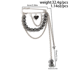 Detailed size view of silver multi-layer fringe chain brooch with heart pendant