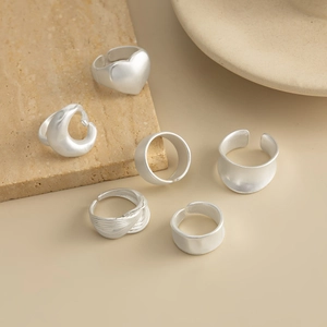 6-piece matte silver adjustable rings set with brushed texture and heart motifs