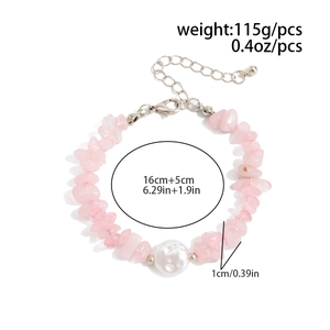 Macro detail of pink turquoise beaded bracelet with baroque pearl and size markings