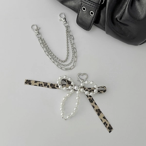 Silver multi-layer chain and pearl bow keychain with leopard print ribbon for bags